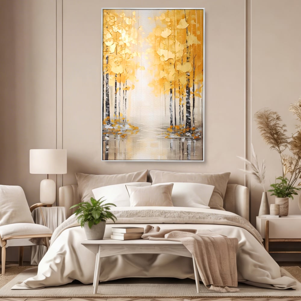 Tablou canvas cu pictura verticala cu padure aurie, in rama de aluminiu argintiu, pe perete intr-un dormitor